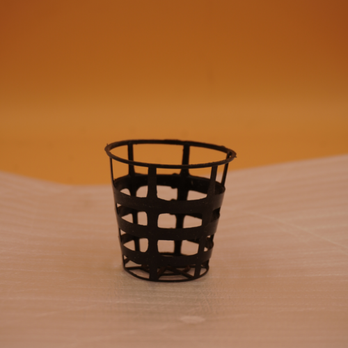 A black plastic hydroponics net pot with an open, lattice-like structure, designed for optimal water and nutrient flow, against a plain background.